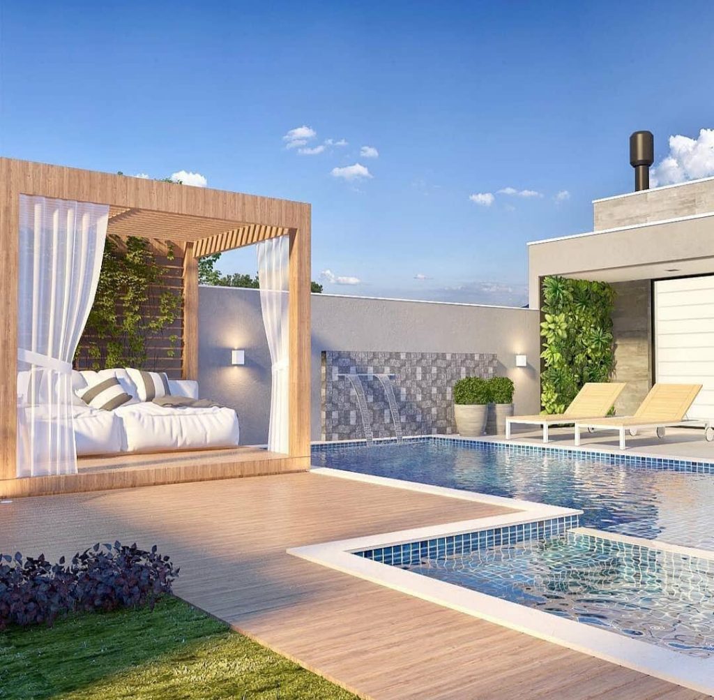 pergolado de madeira na beira da piscina